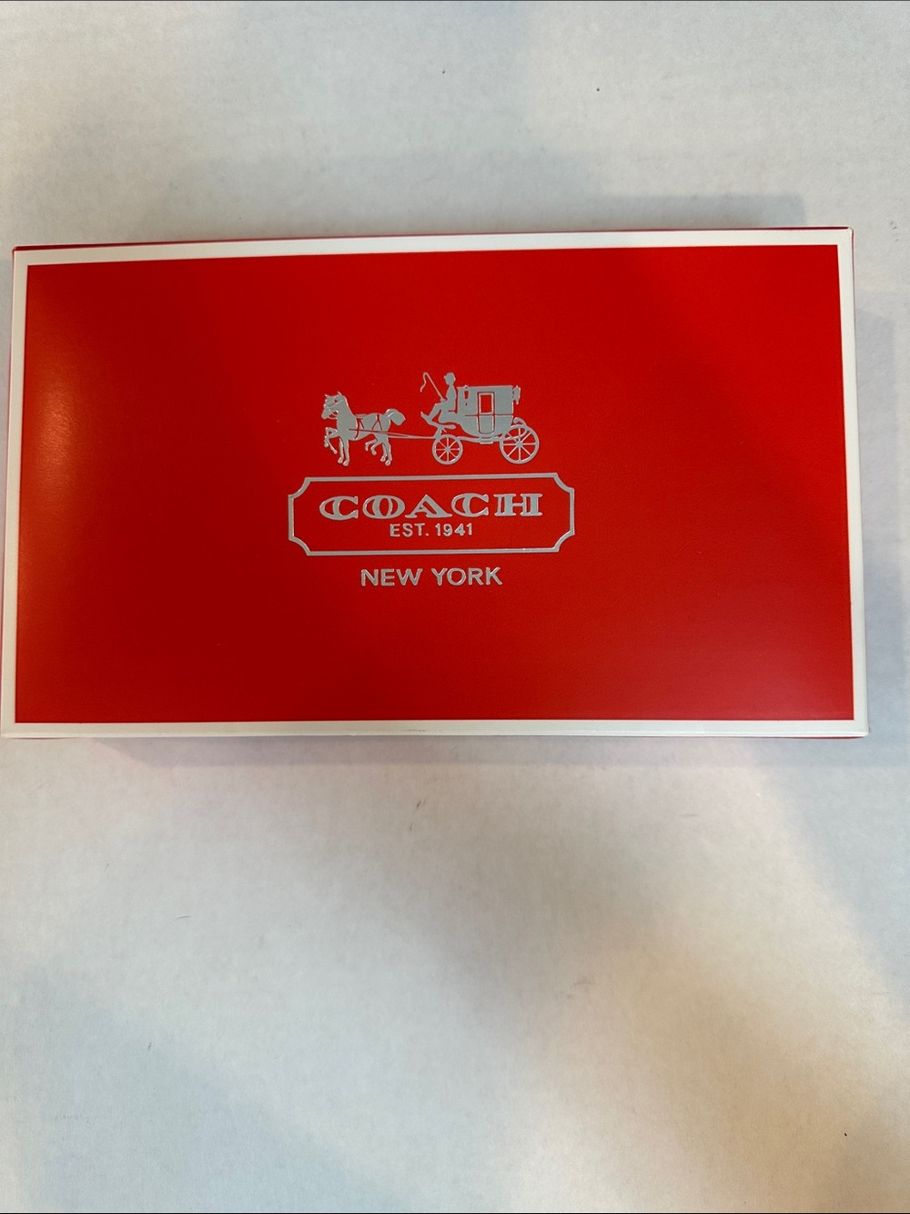 Coach wallet or wristlet box. Signature orange and silver.